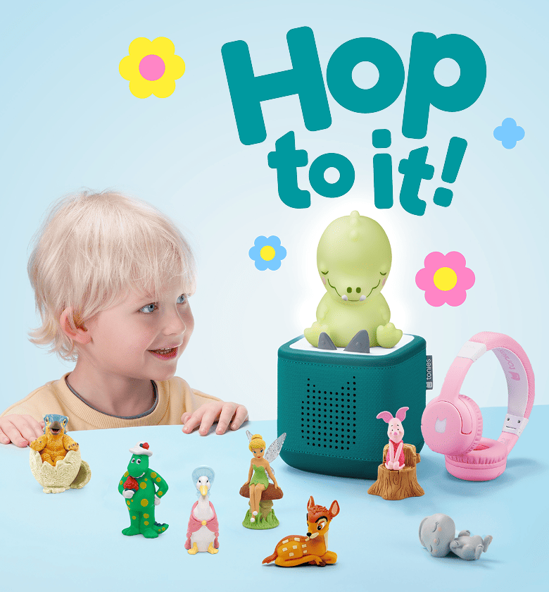 child looking at a teal Toniebox 2 surrounded by Tonies and accessories with text 'Hop to it'