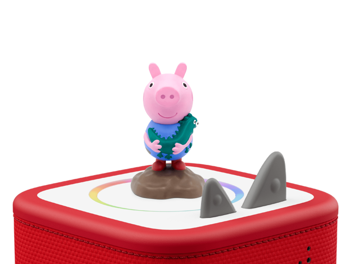 George on a red Toniebox 2 ready to play audio stories and songs