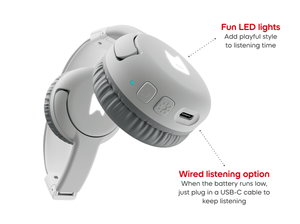 Close-up of ear pad on Moon gray bluetooth headphones for kids, showcasing the USB-C charger and pulsating LEDs light