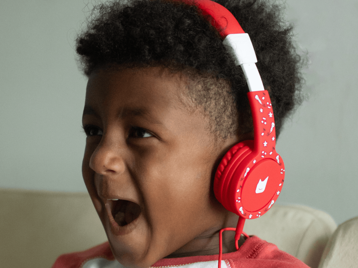 Child Using The Toniesâ® Red Wired Headphones For Kids