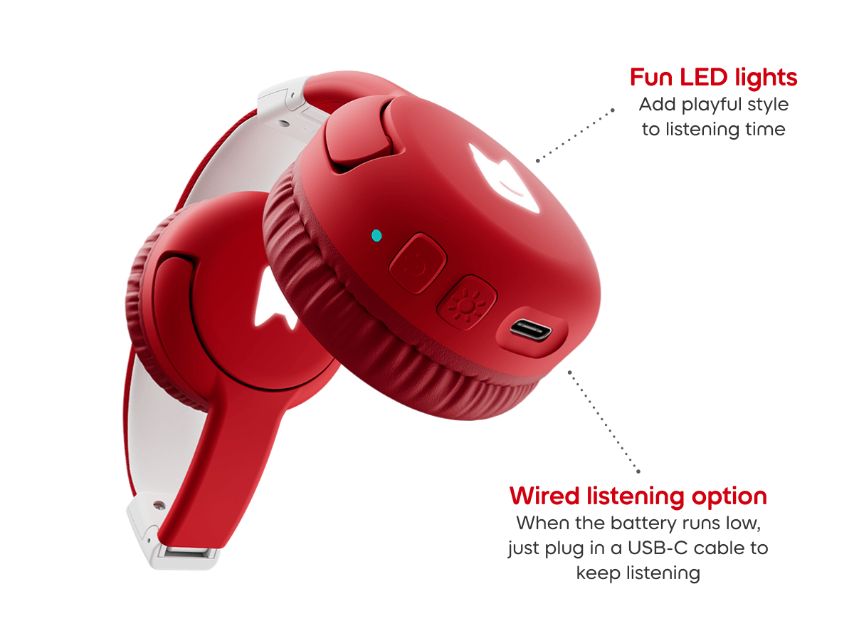Close-up of ear pad on red bluetooth headphones for kids, showcasing the USB-C charger and pulsating LEDs light