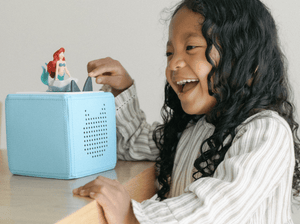 Child Playing With Disney The Little Mermaid Tonie