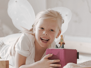 Child Playing With Disney Tinker Bell Tonie